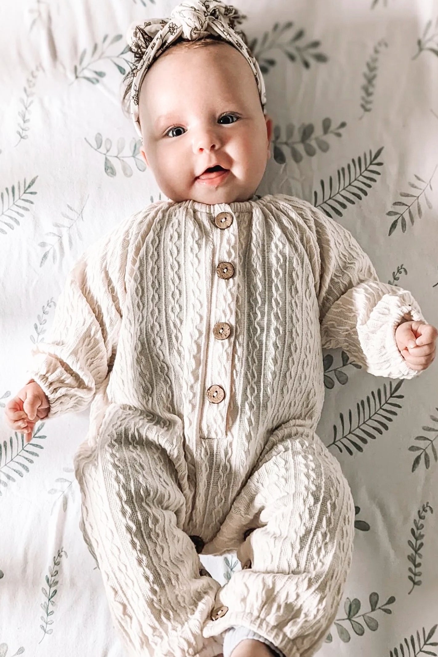 Baby knitted hot sale bodysuit